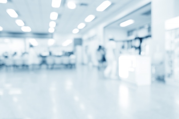 Blurred hospital interior or clinical with people - abstract medical background.