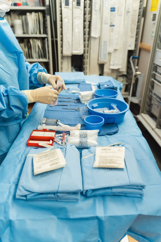 Medical worker with medical supplies