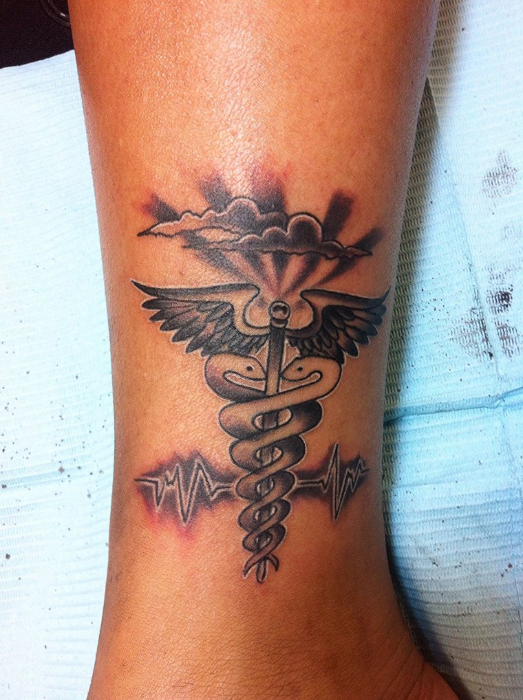 Medical sign tattoo