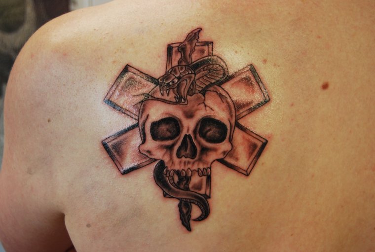 Medical cross with skull