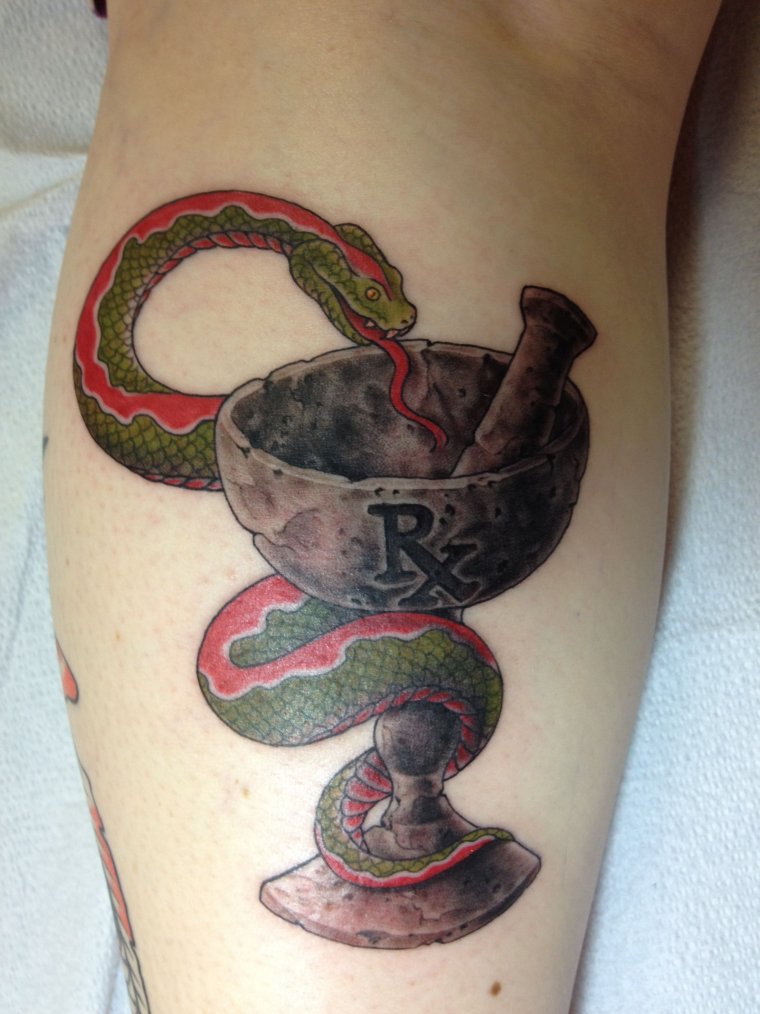 Tattoo medical bowl with a snake